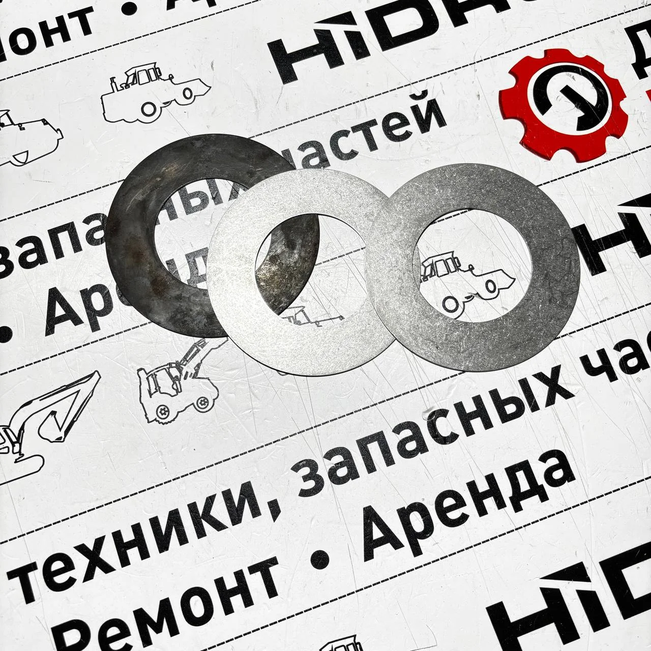 Шайба проставочная на палец нижнего соединения поворотного блока и каретки New Holland B90B, B110B