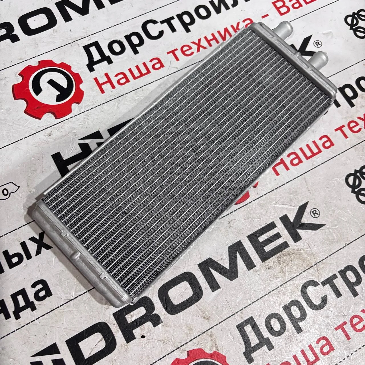 Радиатор отопителя HMK 102 alpha H419084002 / F2590016